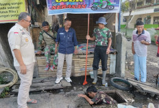 Tanggulangi Luapan Siring Genangi Jalan